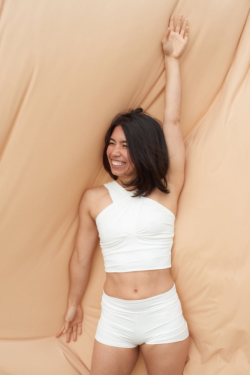 The Draped top is designed with the 50s in mind, and we promise you that this top will bring some extra elegance and beauty into your yoga practice and your everyday life.