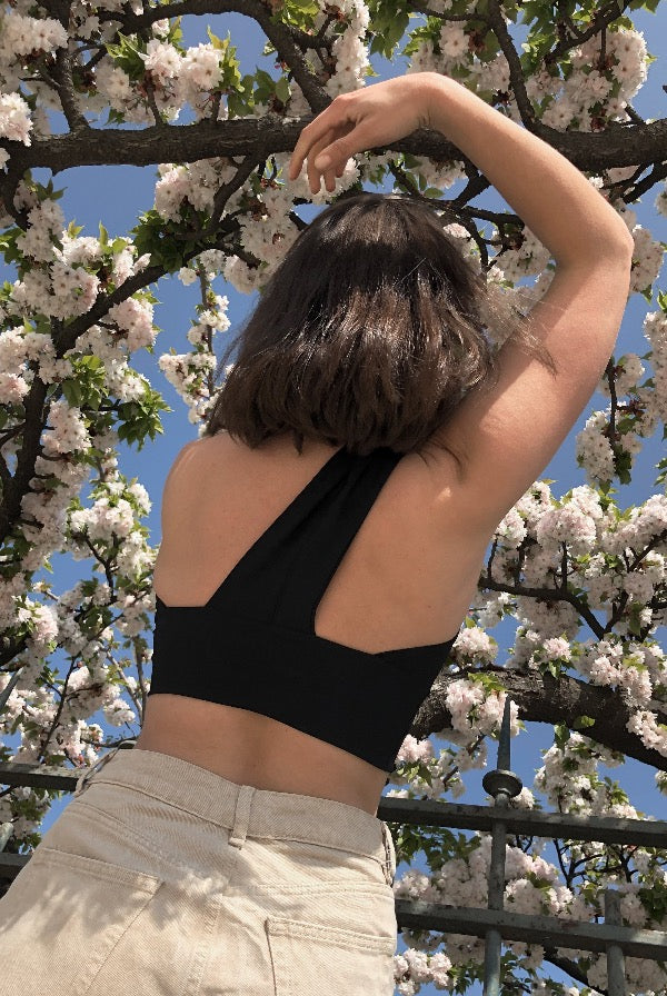 We are sure you will fall in love with this top the moment you put it on. The top elegantly drapes over one shoulder, yet it keeps everything safe and secure so you can do handstands, jump throughs, dropbacks, and any other wild pose you feel like doing.